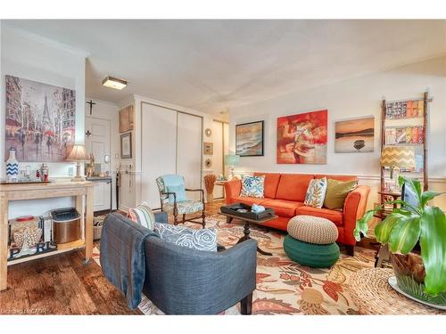 106-107 St. Josephs Drive, Hamilton, ON - Indoor Photo Showing Living Room With Fireplace