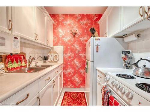 106-107 St. Josephs Drive, Hamilton, ON - Indoor Photo Showing Kitchen With Double Sink
