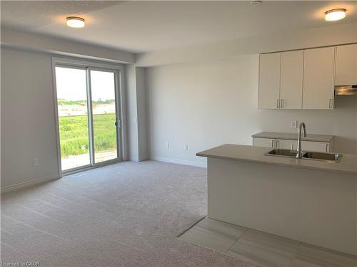 88 Edminston Drive, Centre Wellington, ON - Indoor Photo Showing Kitchen With Double Sink