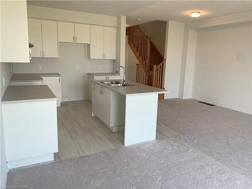 88 Edminston Drive, Centre Wellington, ON - Indoor Photo Showing Kitchen With Double Sink