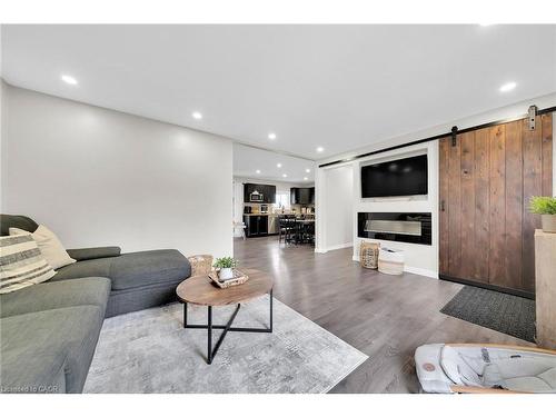 1073 Concession 6 Woodhouse Road, Simcoe, ON - Indoor Photo Showing Living Room With Fireplace