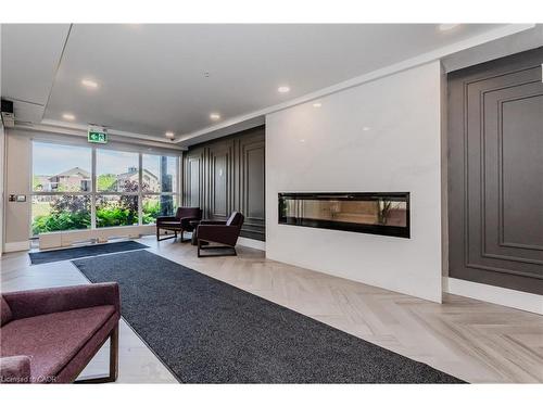 104-15 Prince Albert Boulevard, Kitchener, ON - Indoor Photo Showing Living Room With Fireplace