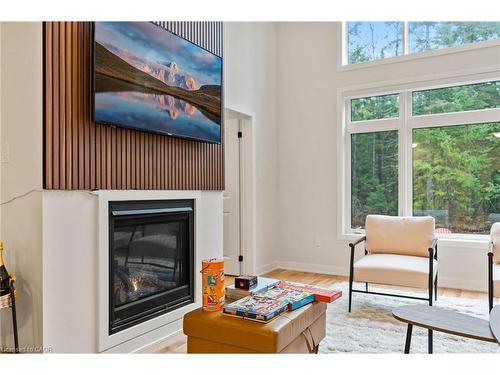 1049 Greensview Drive, Huntsville, ON - Indoor Photo Showing Living Room With Fireplace