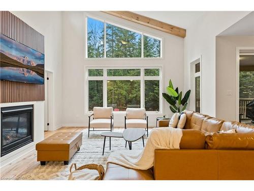 1049 Greensview Drive, Huntsville, ON - Indoor Photo Showing Living Room With Fireplace