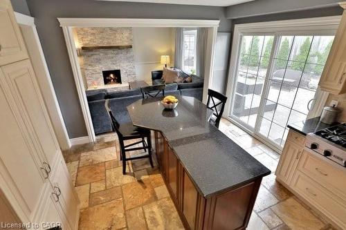 263 Princess Royal Court, Oakville, ON - Indoor Photo Showing Dining Room With Fireplace