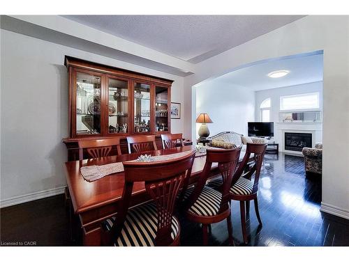 3362 Whilabout Terrace, Oakville, ON - Indoor Photo Showing Dining Room With Fireplace