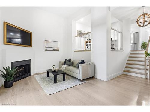 23-1357 Ontario Street, Burlington, ON - Indoor Photo Showing Living Room With Fireplace