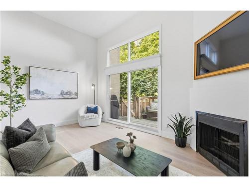 23-1357 Ontario Street, Burlington, ON - Indoor Photo Showing Living Room With Fireplace