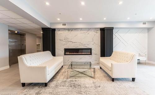 104-120 Springvalley Crescent, Hamilton, ON - Indoor With Fireplace