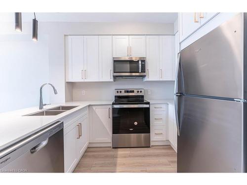 104-120 Springvalley Crescent, Hamilton, ON - Indoor Photo Showing Kitchen With Stainless Steel Kitchen With Double Sink