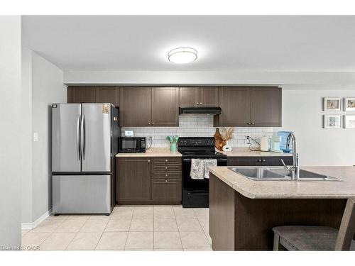 105 Thompson Road, Caledonia, ON - Indoor Photo Showing Kitchen With Double Sink