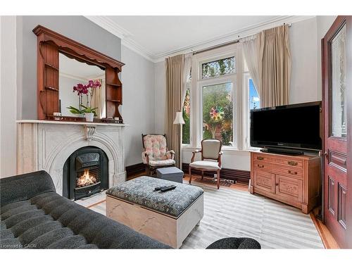 30 Ontario Avenue, Hamilton, ON - Indoor Photo Showing Living Room With Fireplace