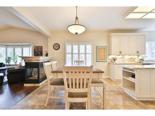4103 Montrose Crescent, Burlington, ON - Indoor Photo Showing Dining Room With Fireplace