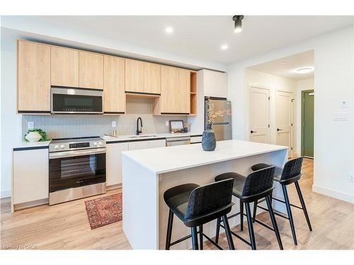 201-4390 Hillview Drive, Beamsville, ON - Indoor Photo Showing Kitchen With Upgraded Kitchen