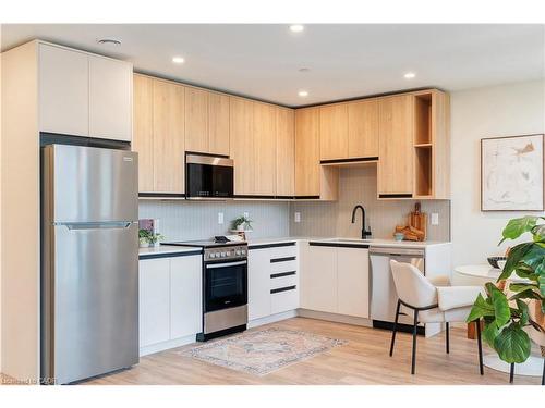 202-4390 Hillview Drive, Beamsville, ON - Indoor Photo Showing Kitchen With Stainless Steel Kitchen