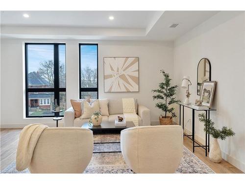 202-4390 Hillview Drive, Beamsville, ON - Indoor Photo Showing Living Room