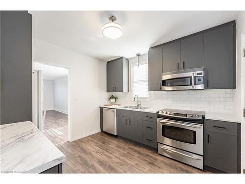 257 Tragina Avenue N, Hamilton, ON - Indoor Photo Showing Kitchen With Double Sink