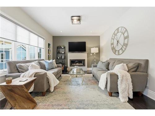 20 Vinegar Hill, Waterdown, ON - Indoor Photo Showing Living Room With Fireplace