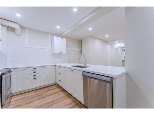 Ll03-100 Charlton Avenue W, Hamilton, ON - Indoor Photo Showing Kitchen With Double Sink