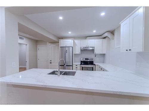 Ll03-100 Charlton Avenue W, Hamilton, ON - Indoor Photo Showing Kitchen With Stainless Steel Kitchen With Double Sink With Upgraded Kitchen