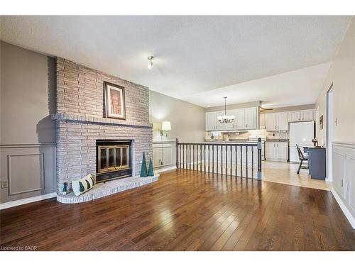 10 Finch Place, Hamilton, ON - Indoor Photo Showing Living Room With Fireplace