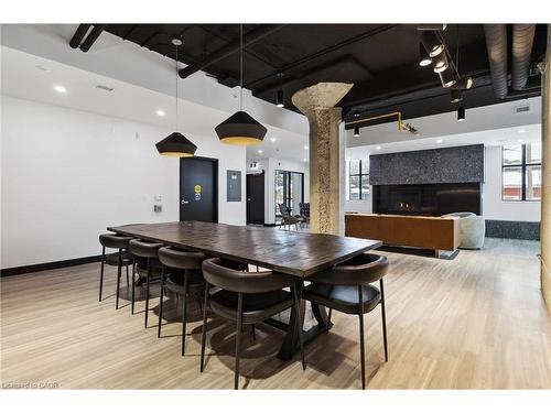 221-120 Huron Street, Guelph, ON - Indoor Photo Showing Dining Room With Fireplace