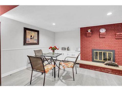 62 Lewis Crescent, Kitchener, ON - Indoor Photo Showing Dining Room With Fireplace