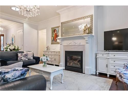 2073 Deramore Drive, Oakville, ON - Indoor Photo Showing Living Room With Fireplace