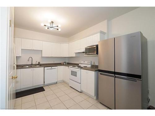 701-255 Keats Way, Waterloo, ON - Indoor Photo Showing Kitchen With Double Sink