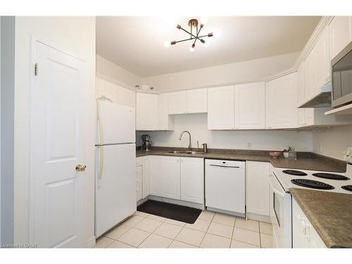 701-255 Keats Way, Waterloo, ON - Indoor Photo Showing Kitchen With Double Sink