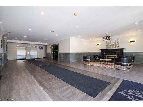 701-255 Keats Way, Waterloo, ON - Indoor Photo Showing Other Room With Fireplace