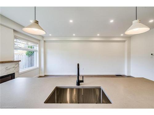 14 Olivia Place, Ancaster, ON - Indoor Photo Showing Kitchen With Fireplace