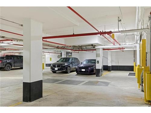 Th10-155 Caroline Street S, Waterloo, ON - Indoor Photo Showing Garage