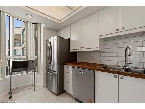 2212-4470 Tucana Court, Mississauga, ON - Indoor Photo Showing Kitchen With Double Sink