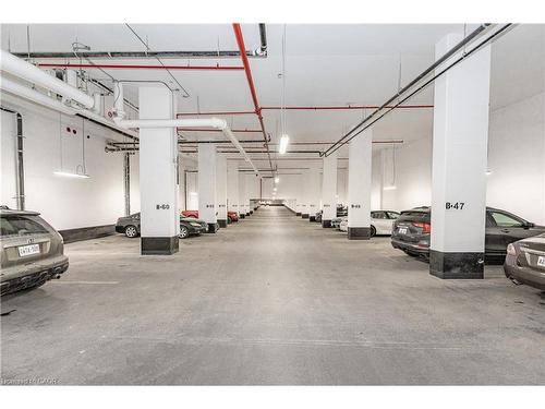 2203-55 Duke Street, Kitchener, ON - Indoor Photo Showing Garage