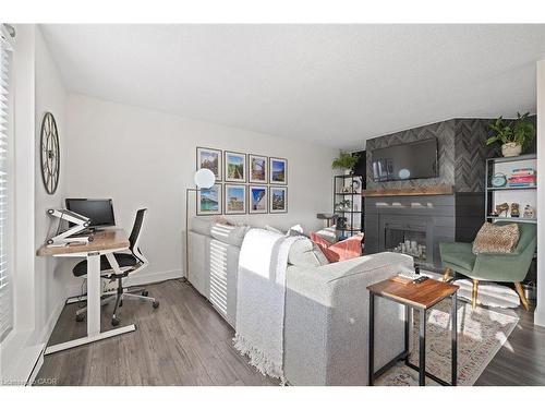 901-700 Dynes Road, Burlington, ON - Indoor With Fireplace