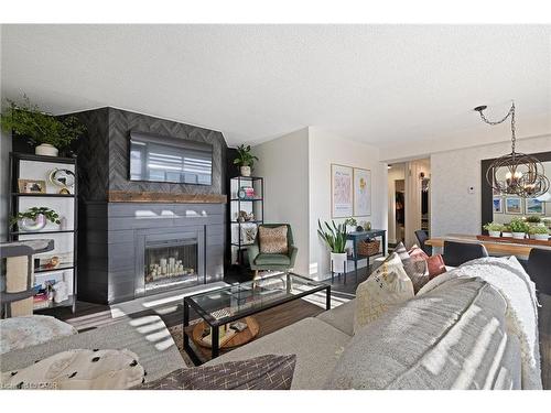 901-700 Dynes Road, Burlington, ON - Indoor With Fireplace