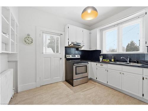 110 Houghton Avenue S, Hamilton, ON - Indoor Photo Showing Kitchen With Double Sink