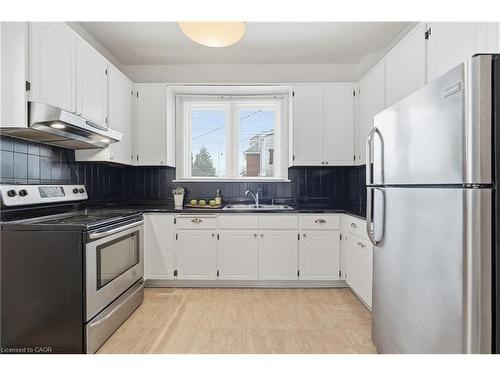 110 Houghton Avenue S, Hamilton, ON - Indoor Photo Showing Kitchen With Double Sink