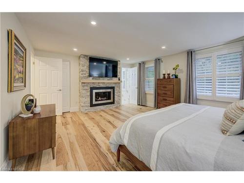 38 Academy Crescent, Waterloo, ON - Indoor Photo Showing Bedroom With Fireplace