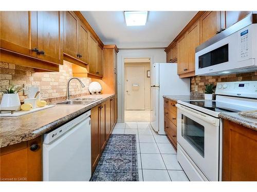 108-510 Queenston Road, Hamilton, ON - Indoor Photo Showing Kitchen With Double Sink