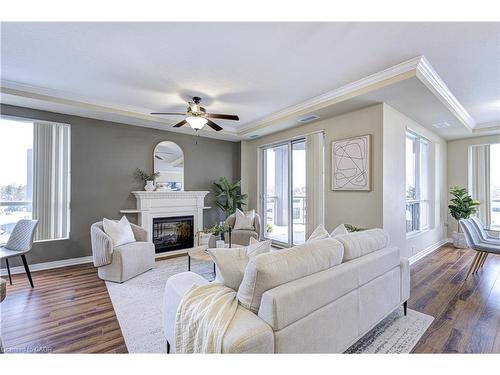 608-539 Belmont Avenue W, Kitchener, ON - Indoor Photo Showing Living Room With Fireplace