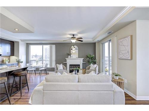 608-539 Belmont Avenue W, Kitchener, ON - Indoor Photo Showing Living Room With Fireplace