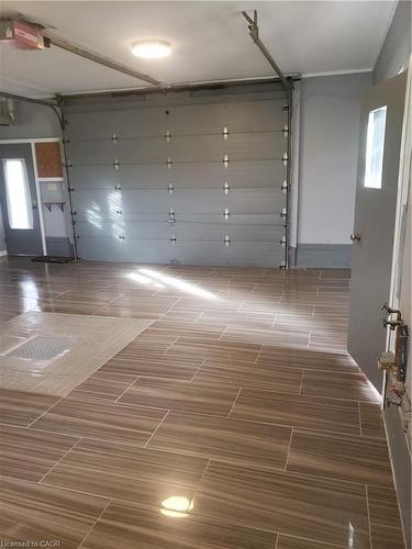Barndominium-65 Erie Avenue N, Fisherville, ON - Indoor Photo Showing Garage