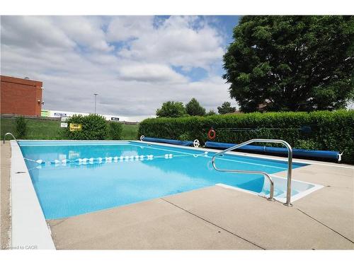 507-24 Midland Drive, Kitchener, ON - Outdoor With In Ground Pool