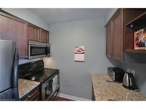 707-2379 Central Park Drive, Oakville, ON - Indoor Photo Showing Kitchen