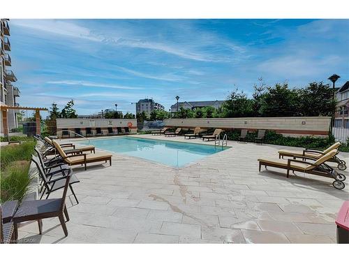 707-2379 Central Park Drive, Oakville, ON - Outdoor With In Ground Pool