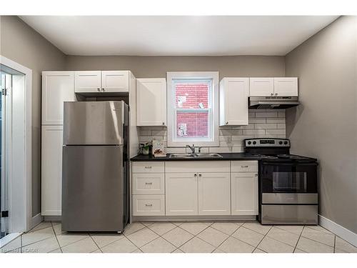 100 Sherman Avenue N, Hamilton, ON - Indoor Photo Showing Kitchen With Double Sink