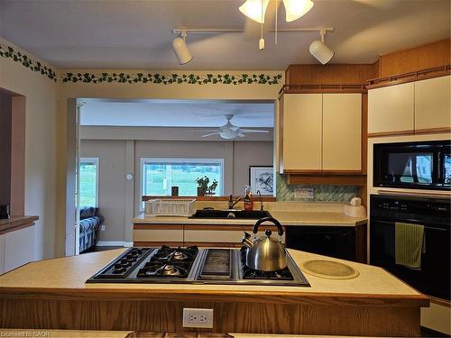 Main House-65 Erie Avenue N, Fisherville, ON - Indoor Photo Showing Kitchen With Double Sink