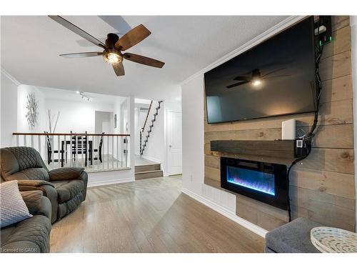 4208 Stonemason Crescent, Mississauga, ON - Indoor Photo Showing Living Room With Fireplace